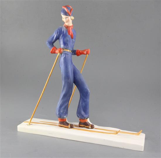 A William Goebel Art Deco pottery figure of a woman skier, height 32.5cm, ski poles re-attached